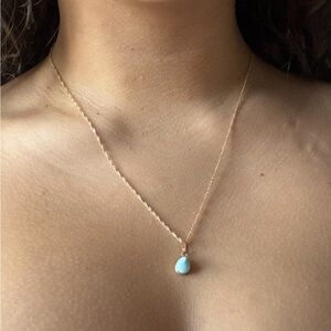 Elegant Gold Necklace with Blue Pendant